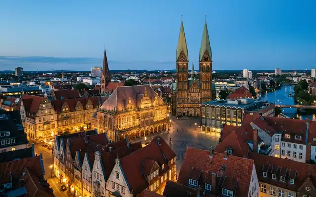 Bremen market square at dusk, the town hall and the twin towers of the cathedral