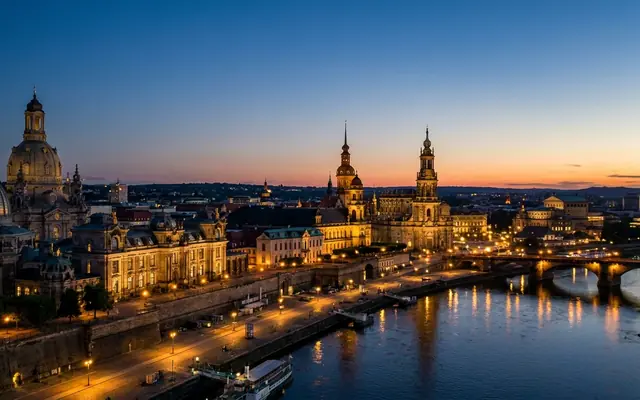 Dresden old town silhouette along the Elbe river at dusk