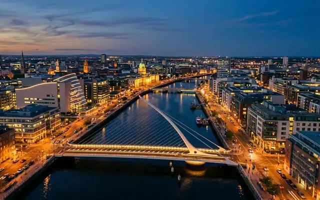 The harp-shaped Samuel Beckett Bridge over the River Liffey in Dublin's Docklands at dusk