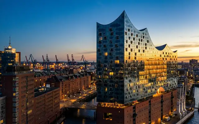 The Elbphilharmonie and the Speicherstadt warehouses in Hamburg at dusk