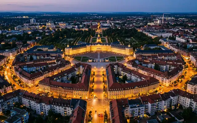 Karlsruhe Palace and the fan-shaped street layout from above at dusk