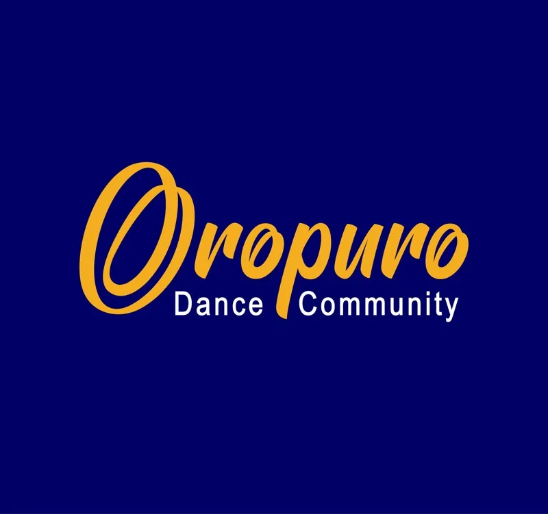 Salsa partner work in a mirrored studio at Oropuro Dance Community
