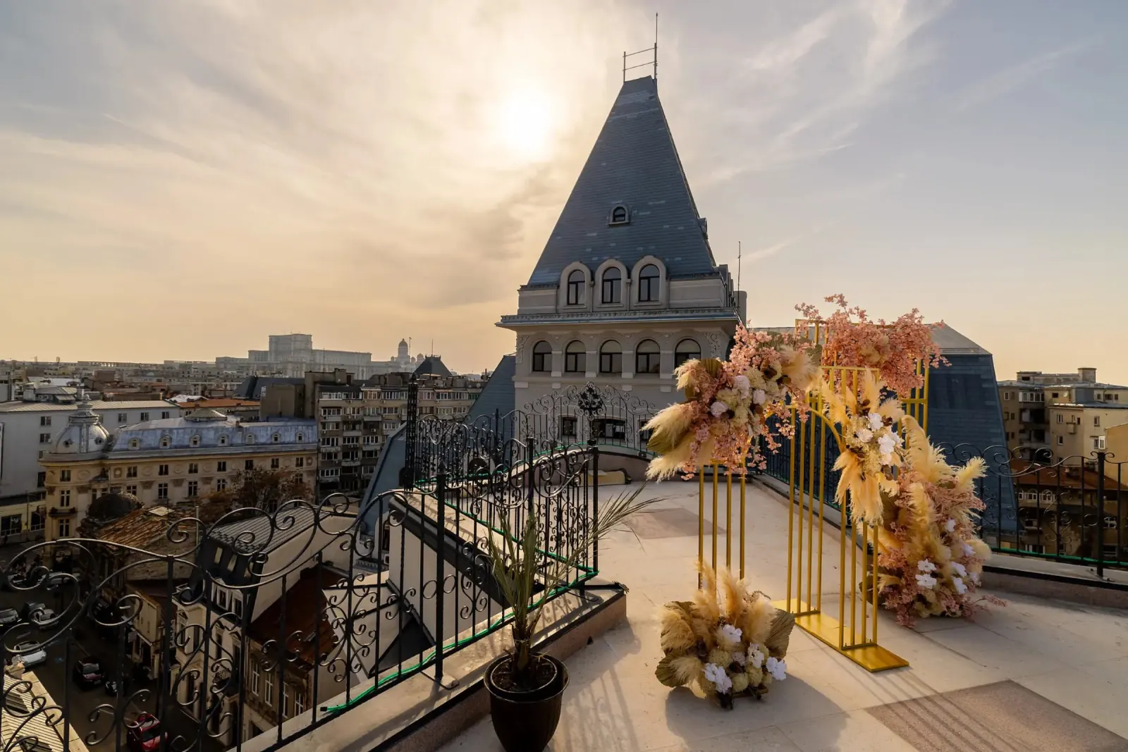 Rooftop terrace at Mille 18 Events with sunset view over historic Bucharest