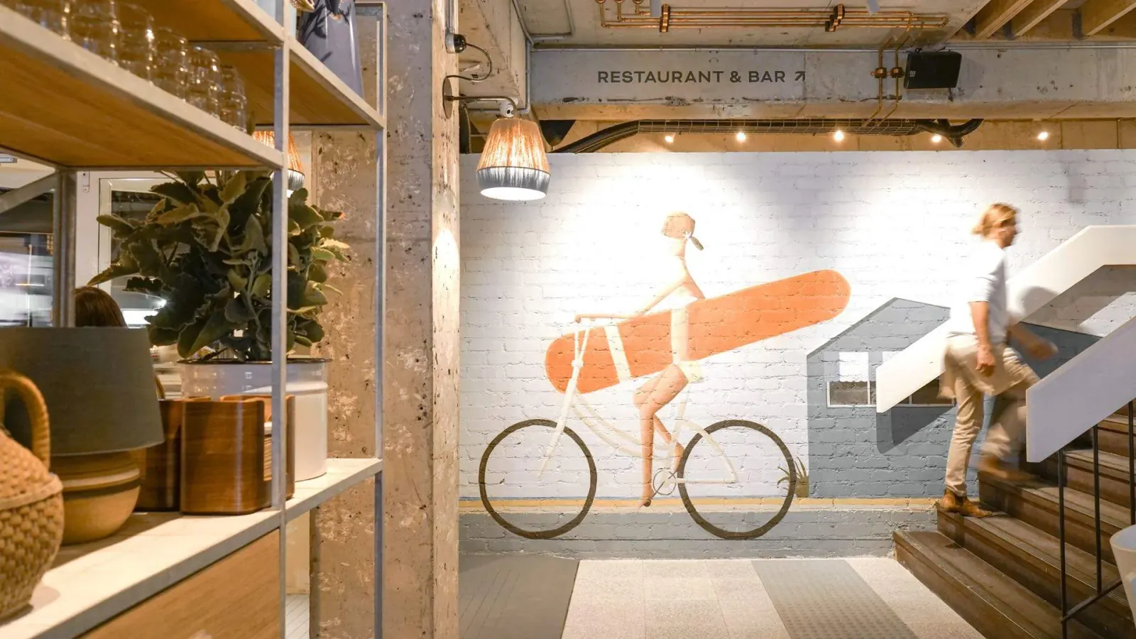The Collaroy entrance with surfer wall mural and staircase, Sydney Northern Beaches