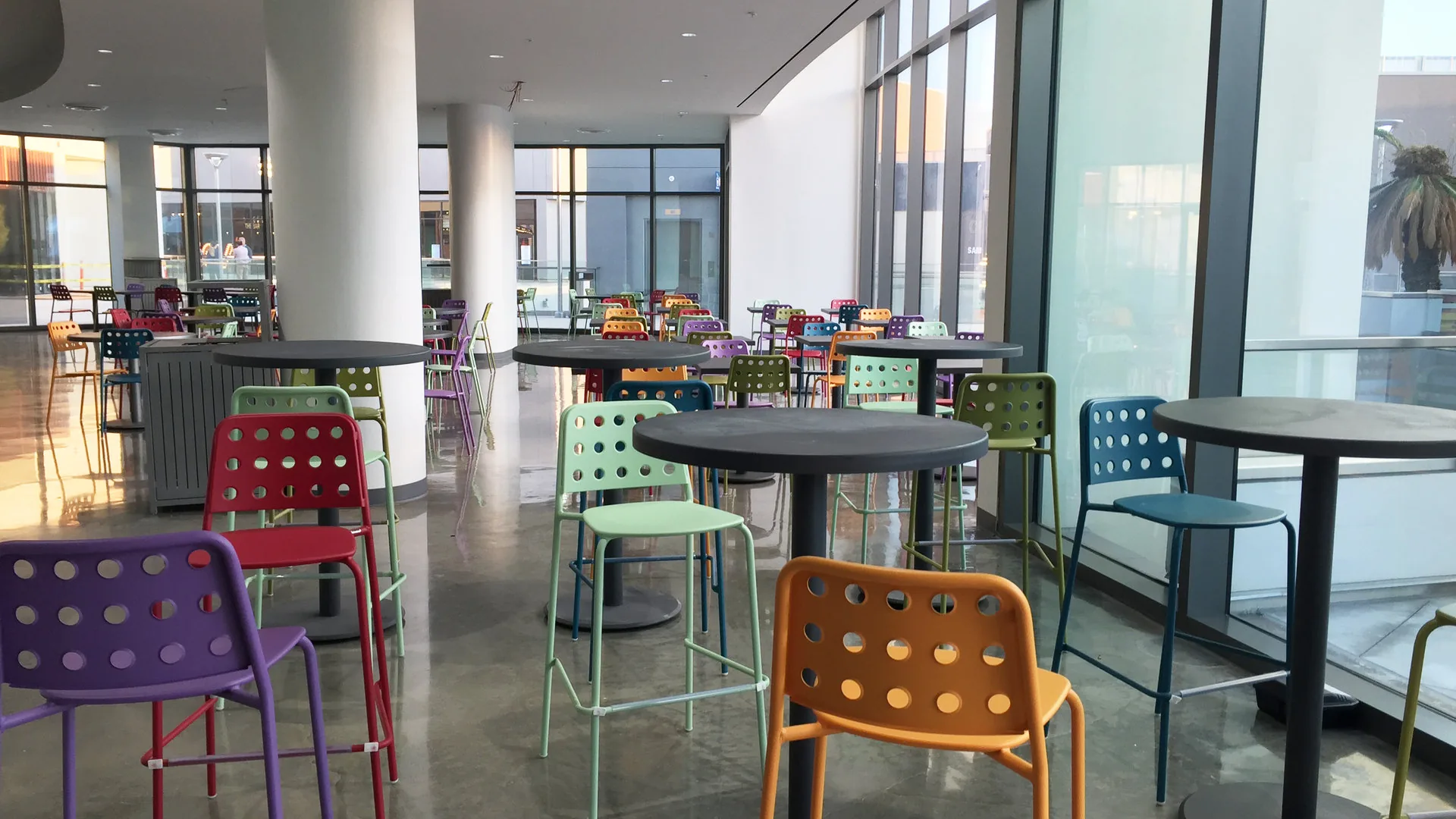 The Source OC building with colorful architecture and dining area in Buena Park