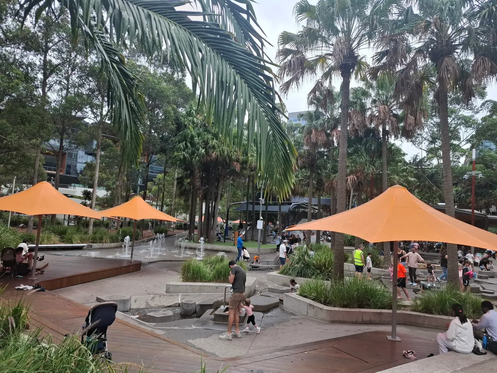 Palm Grove's iconic orange shade sails and palm trees at Darling Harbour Sydney, the Latin Nights venue setting