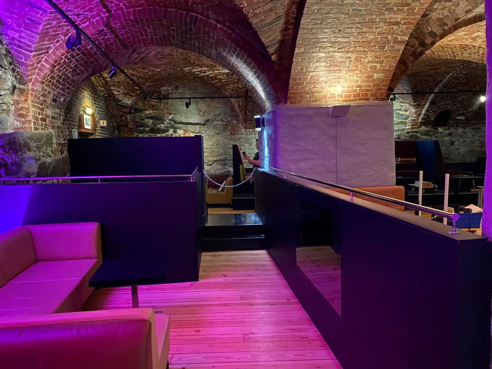 ME Nightclub stone vault cellar interior with purple club lighting in Trondheim Norway