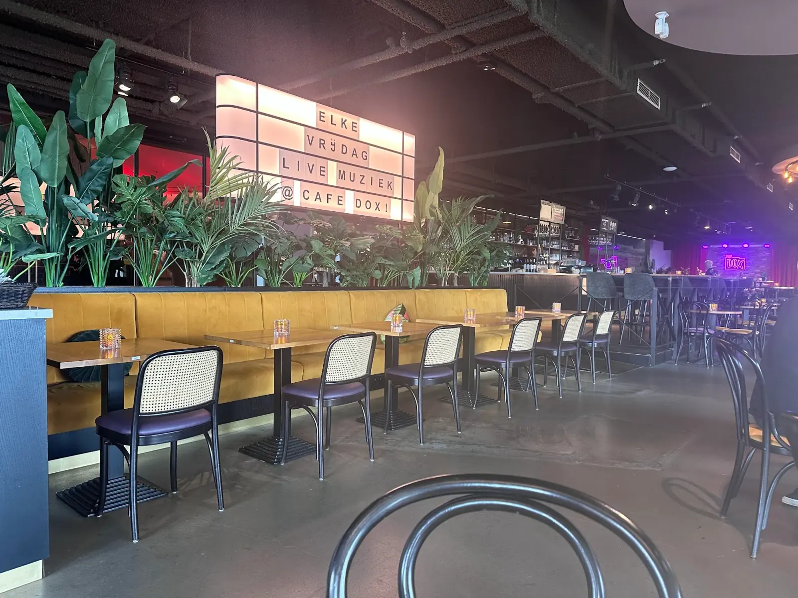 Dox interior with live music sign and stage area in Rotterdam Netherlands