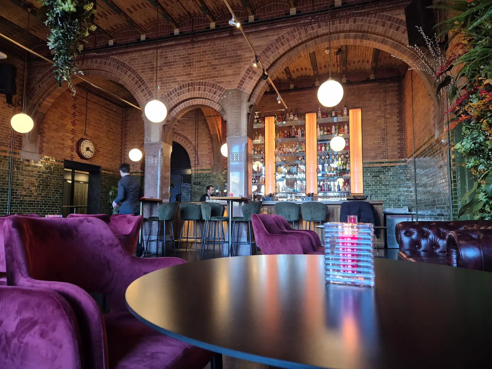 Grand arched brick interior and bar at The Brokers Bar in Amsterdam