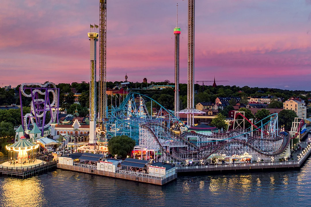Aerial view of Gröna Lund amusement park and event venue in Stockholm at sunset
