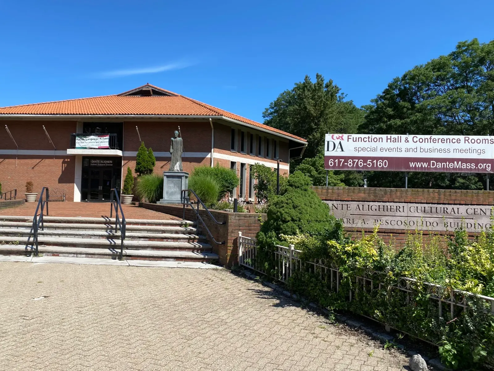 Brick exterior and entrance sign of the Dante Alighieri Cultural Center, Cambridge
