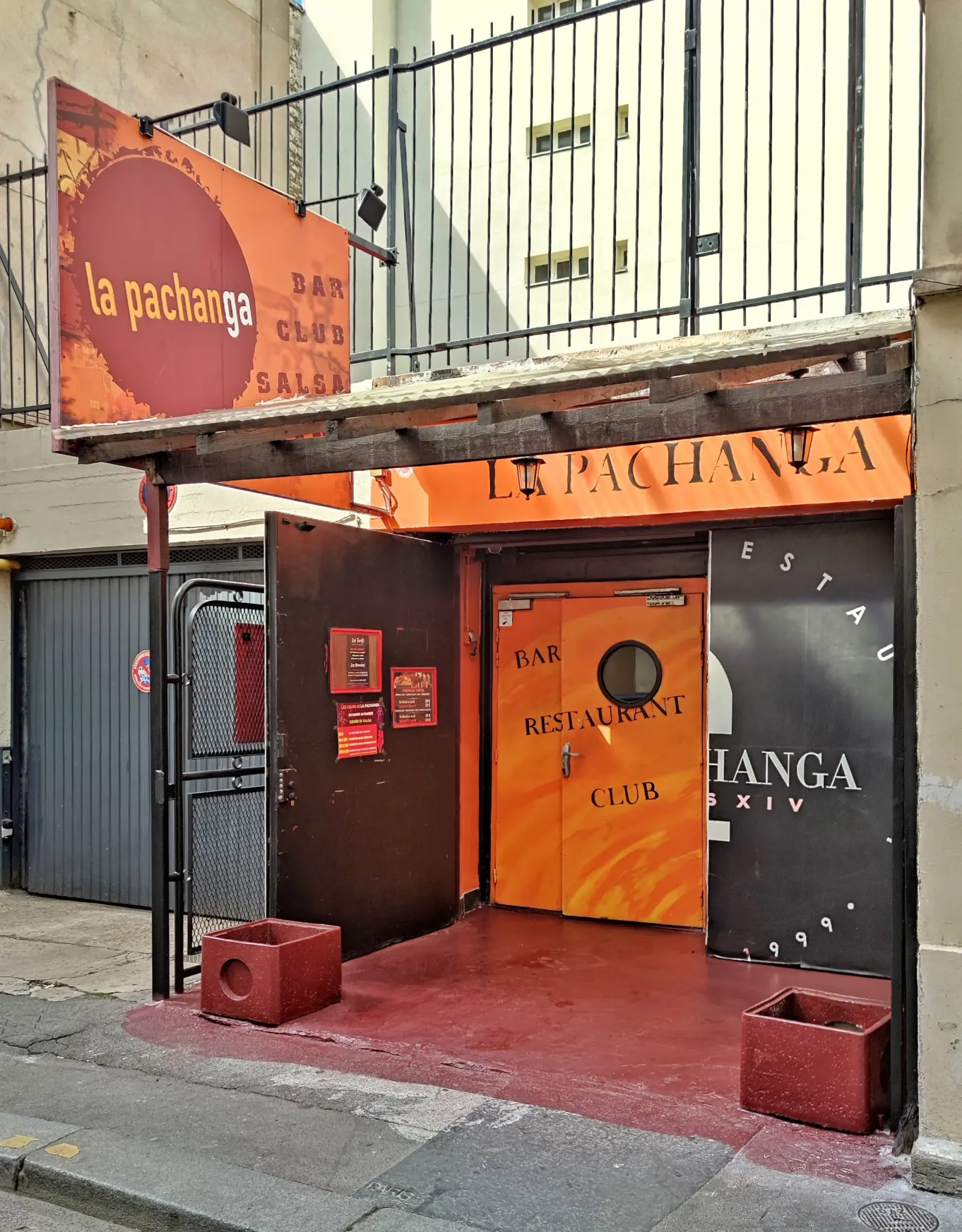 Branded entrance and signage of La Pachanga Bar Club Salsa in Paris