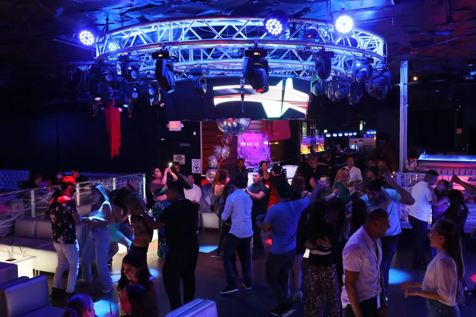 Packed dance floor with crowd and lights at V Lounge Bar Nightclub Los Angeles