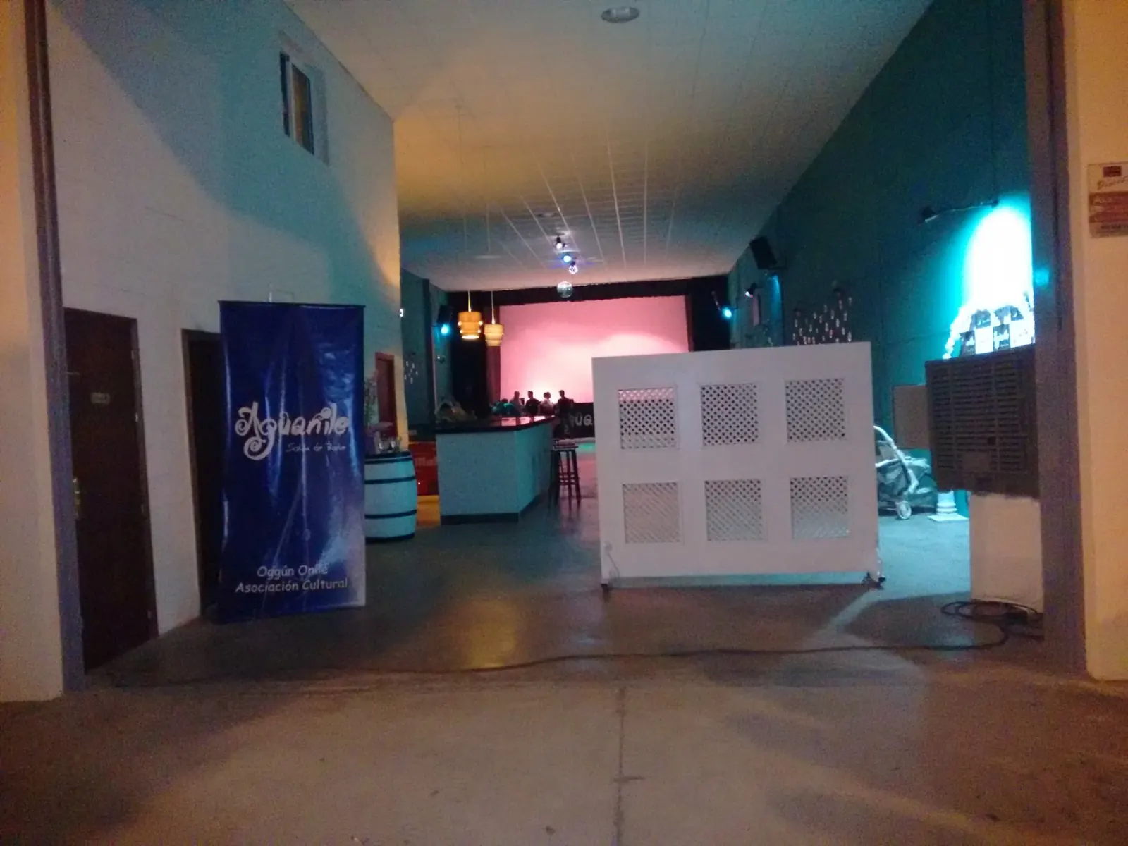 Sala Aguanile entrance with branded banner and bar in Cordoba