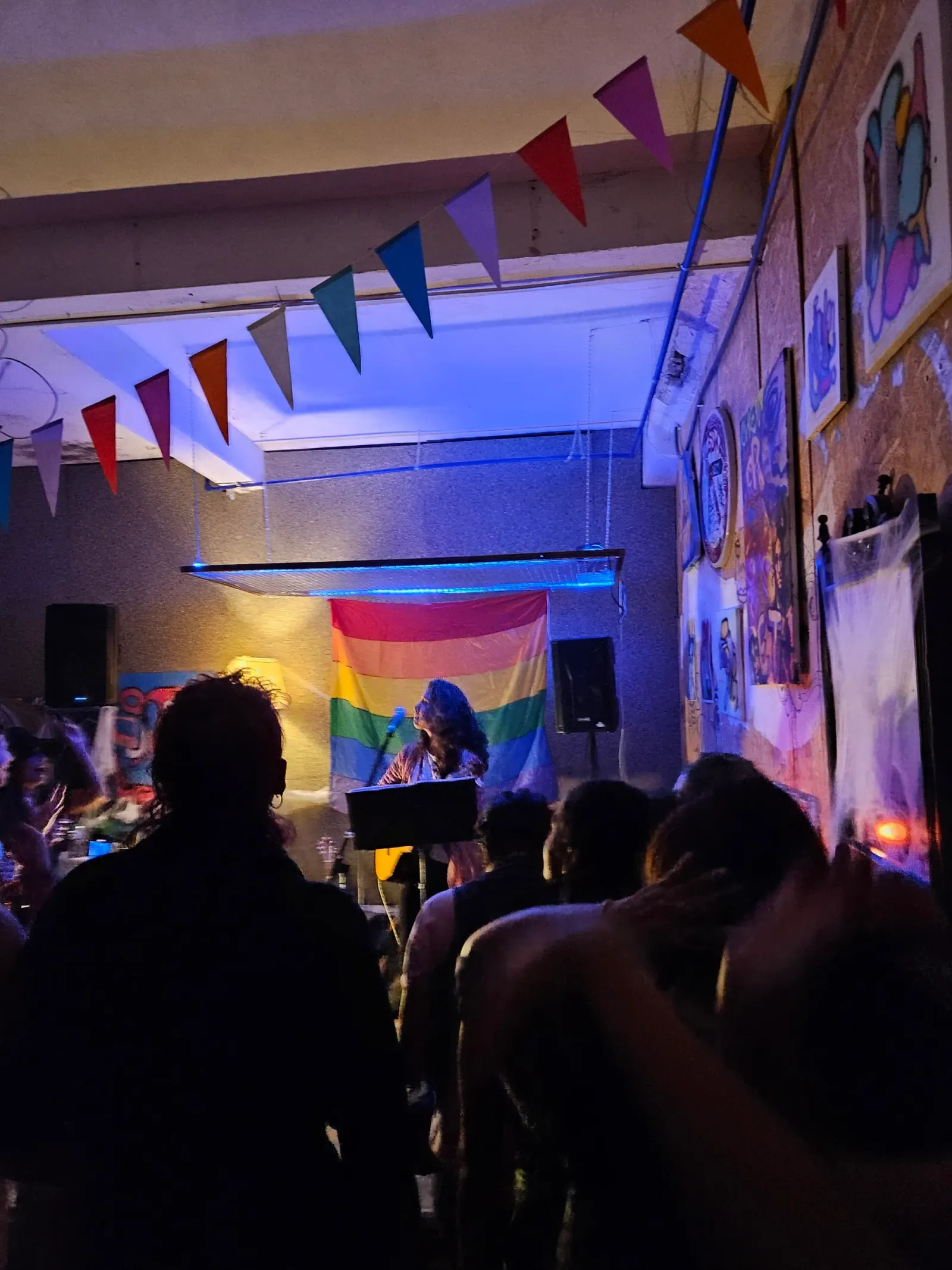 DJ and party crowd with blue lighting at Espaço Cultural Jubilant Porto Portugal