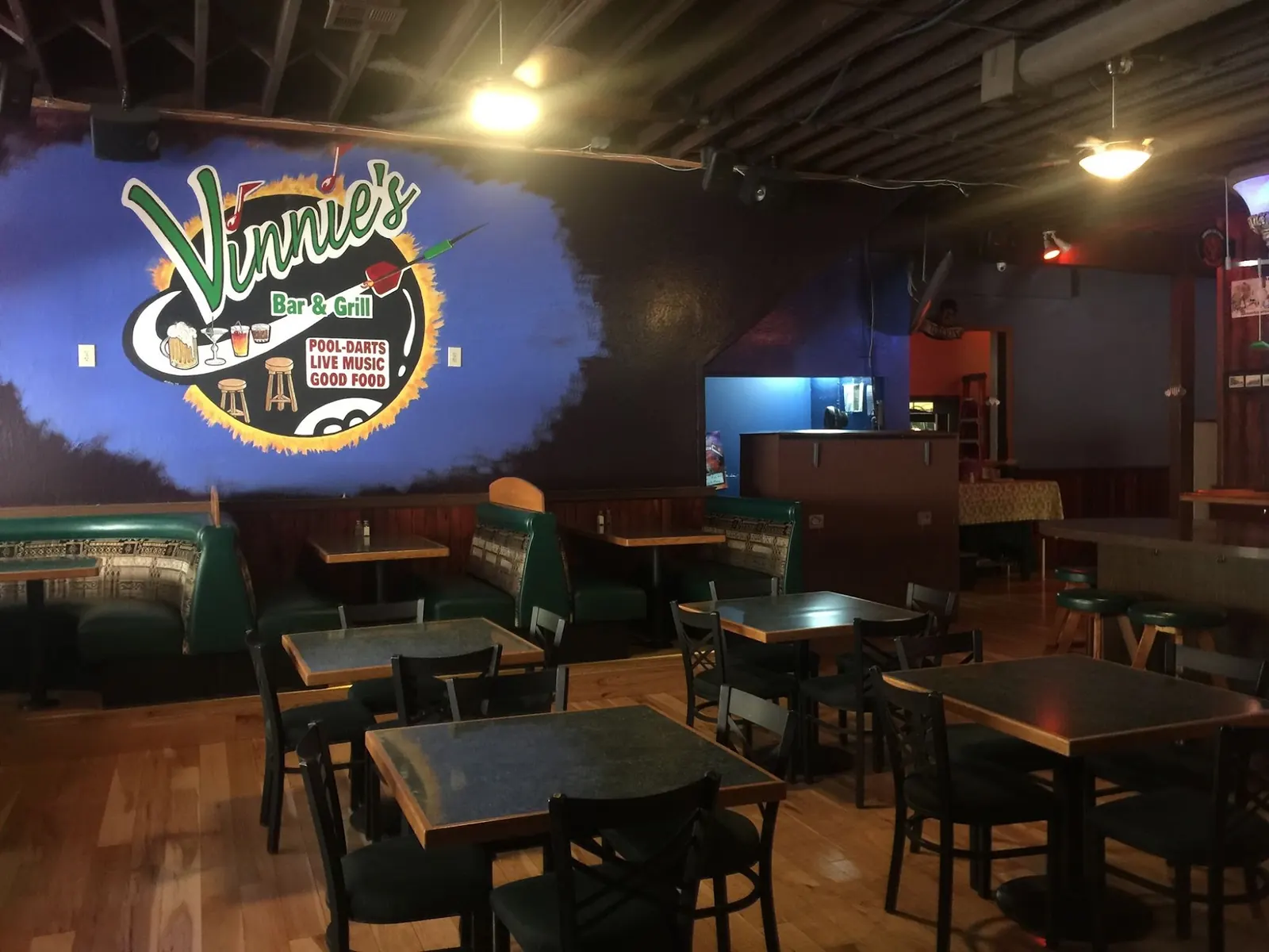 Booths and tables in the main room of Vinnie's Bar & Grill Concord