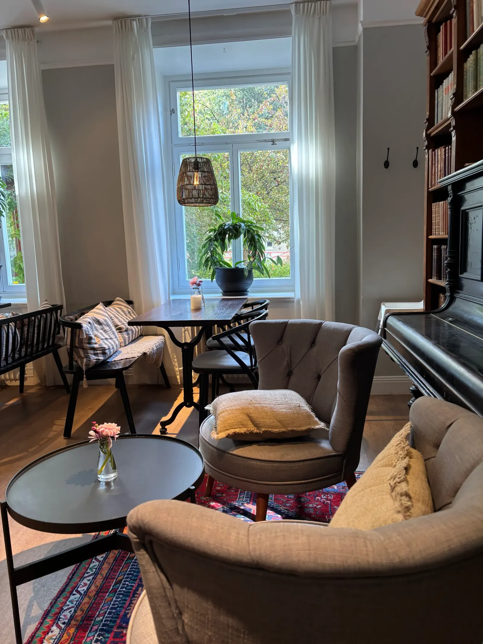 Birkagården cozy interior lounge with reading nook and bookshelves