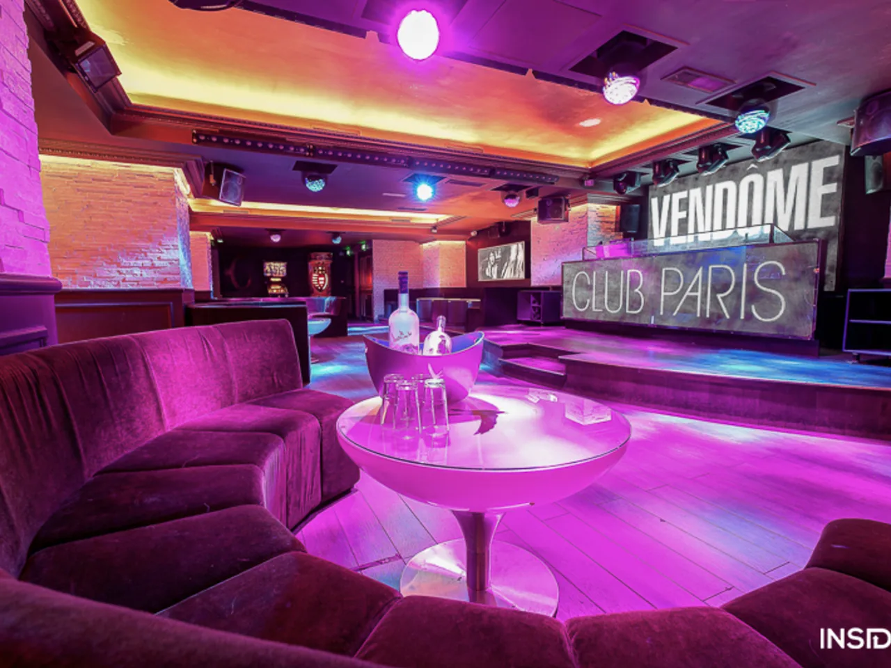 Vendome Club Paris dance floor and lounge area with atmospheric lighting