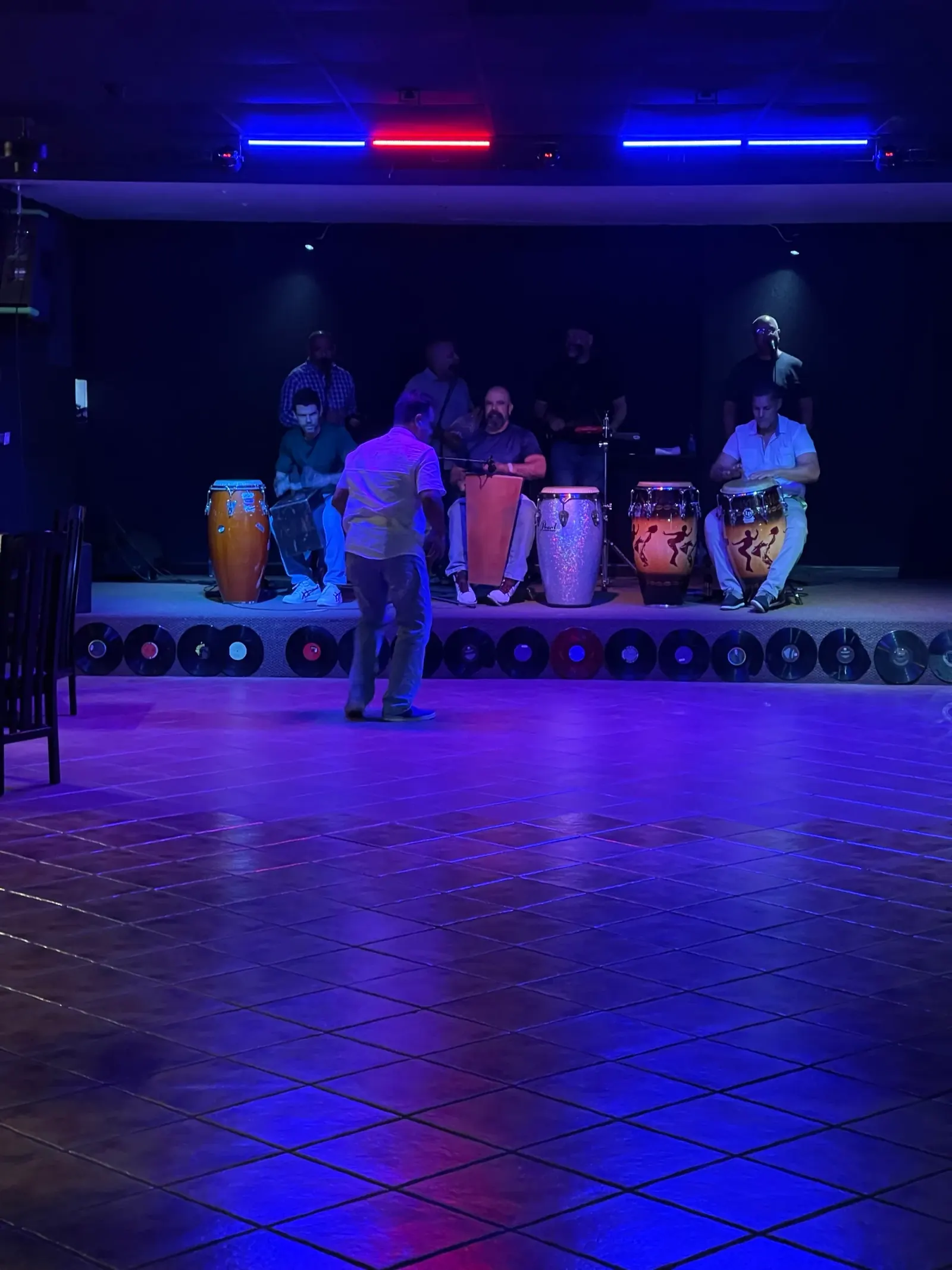 Empty dance floor and conga band on stage at Música Bar Lounge San Juan