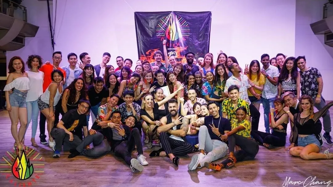 Large group of dancers at Caliente Dance Studio Singapore event