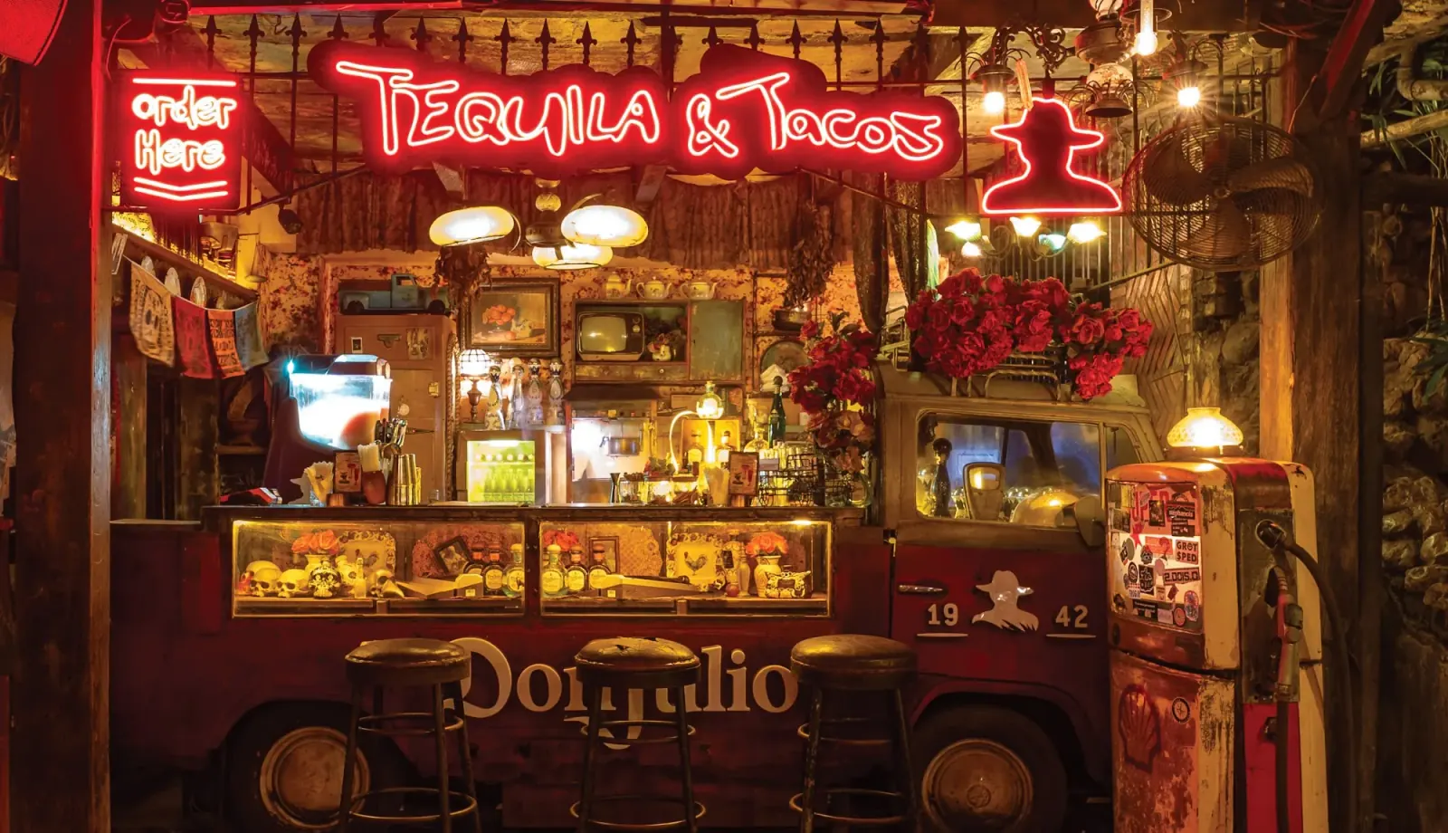 Tequila and Tacos neon-lit bar truck inside La Favela Bali