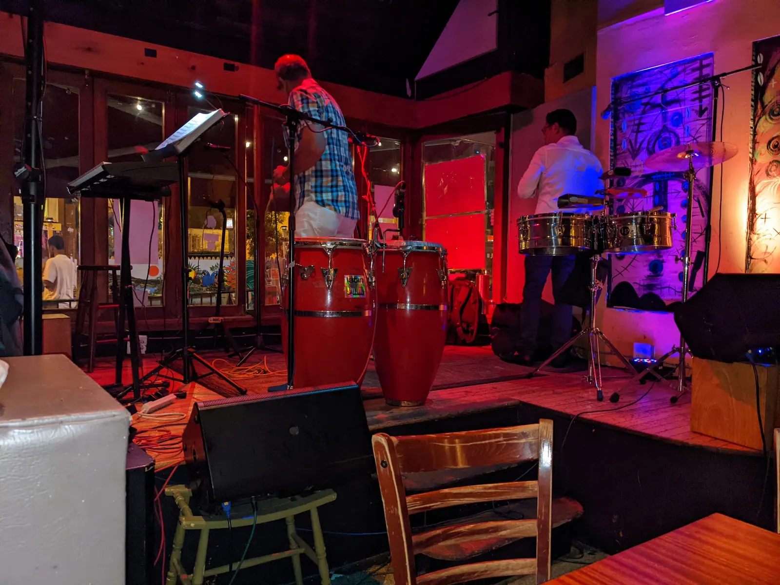Congas and timbales on the stage at Bossa Bistro and Lounge in Washington under red and blue light