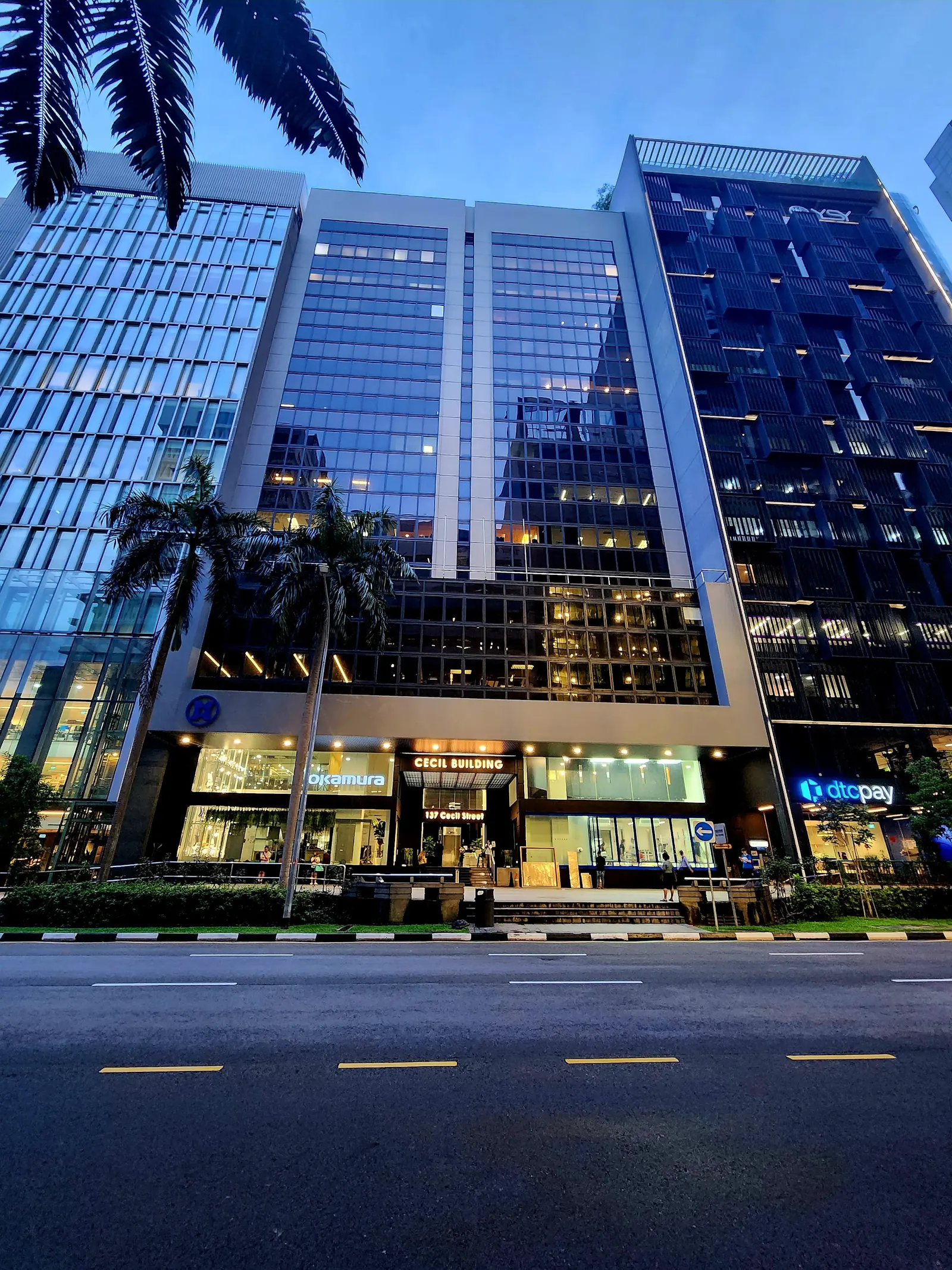Full facade of Cecil Building at 137 Cecil Street, Singapore, at dusk