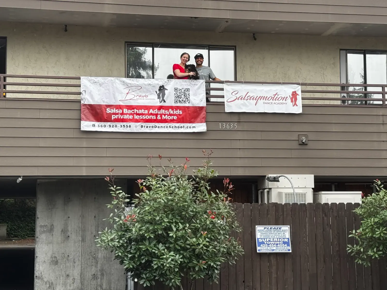 Bravo Dance School and Salsa y Motion banners on the venue exterior