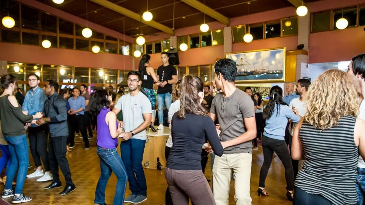 Salsa Foundation social dancing night with couples on the dance floor in Melbourne