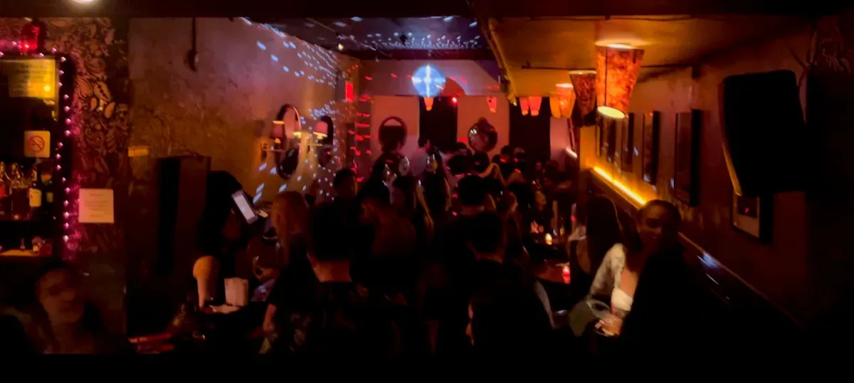 Crowd and party lighting on the upstairs dance floor at Solas Bar NYC