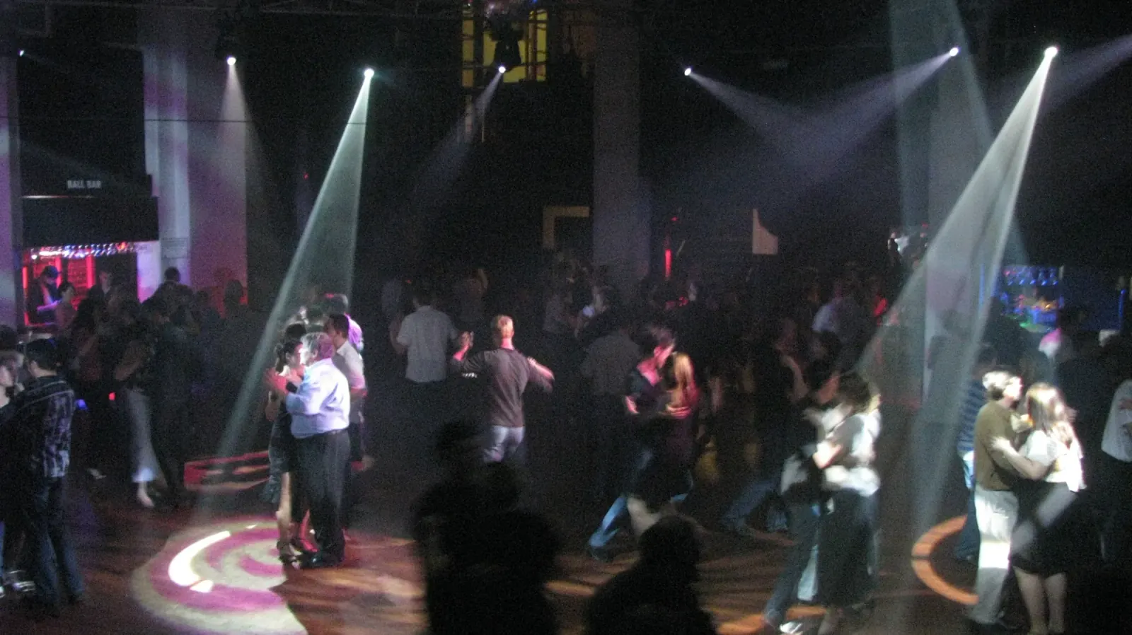 Packed social dance floor with crowd and stage lights at Gilkisons Dance Studio Perth