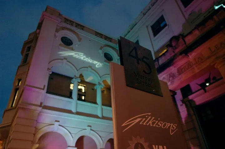 Gilkisons Dance Studio building exterior at night on Murray Street in Perth