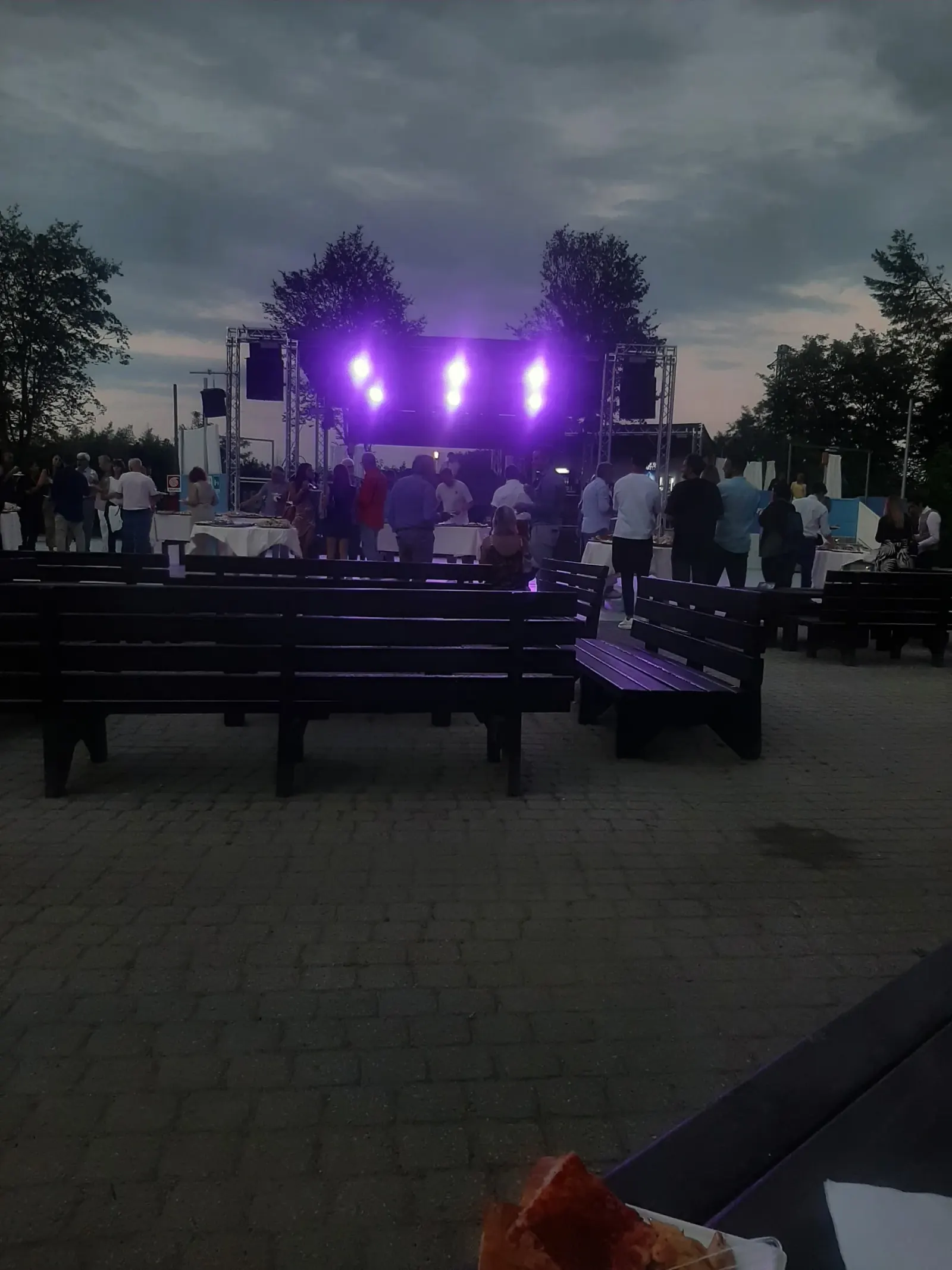 Cacao Latino outdoor stage at night with crowd in Moncalieri