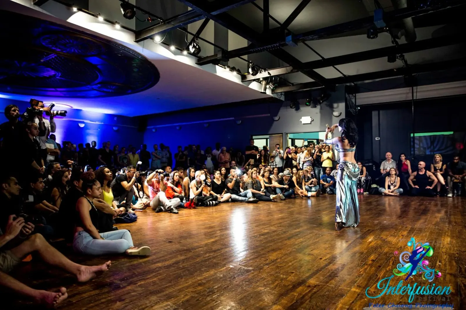 Dance event with packed crowd and performer on wooden floor at Dance Loft on 14, Washington D.C.